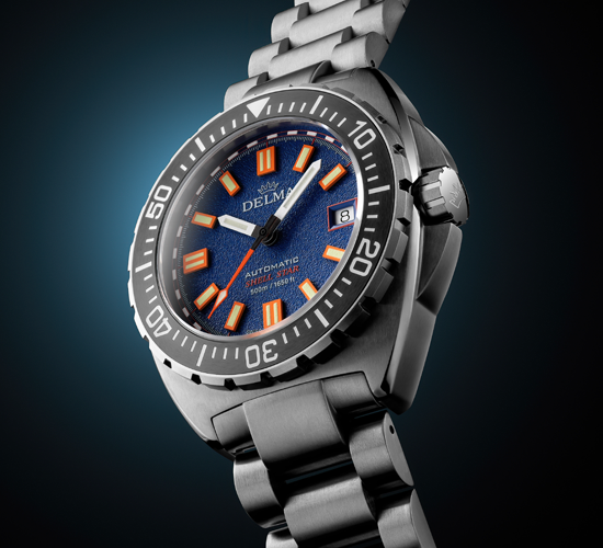 Delma Shell Star Titanium automatic dive watch with blue and orange dial