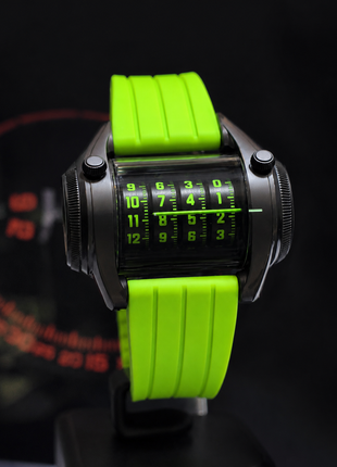 ANGLES Cylindrex Black Serpent automatic watch with black cylindrical display and neon-green silicone strap