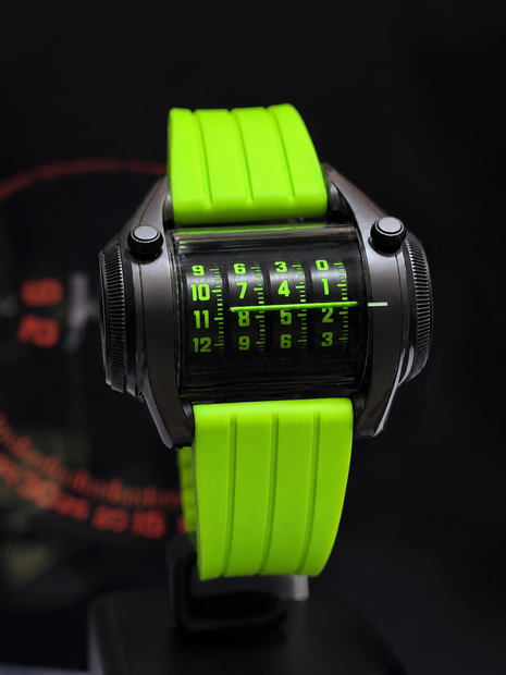 ANGLES Cylindrex Black Serpent automatic watch with black cylindrical display and neon-green silicone strap