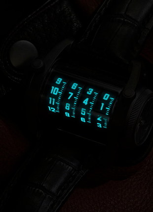 Lume view of ANGLES Cylindrex Silver Cobalt 40mm automatic watch