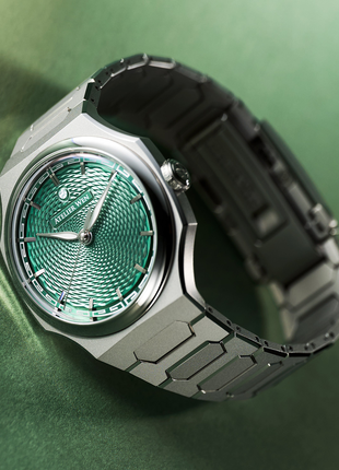 Angled view of Atelier Wen Perception V3 Yún Green with hand-turned guilloché dial and micro-frosted 904L steel case