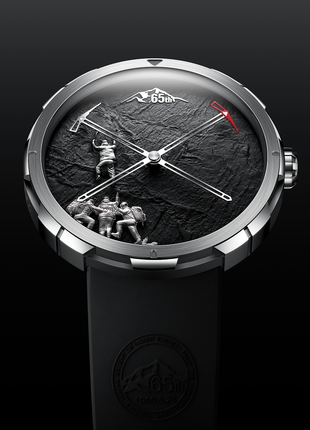 Everest bedrock dial with ice-axe-inspired hands and climbing scene