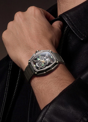 Wristshot of CIGA DESIGN Hunter Vintage Brown Gold automatic skeleton watch with integrated H-link bracelet