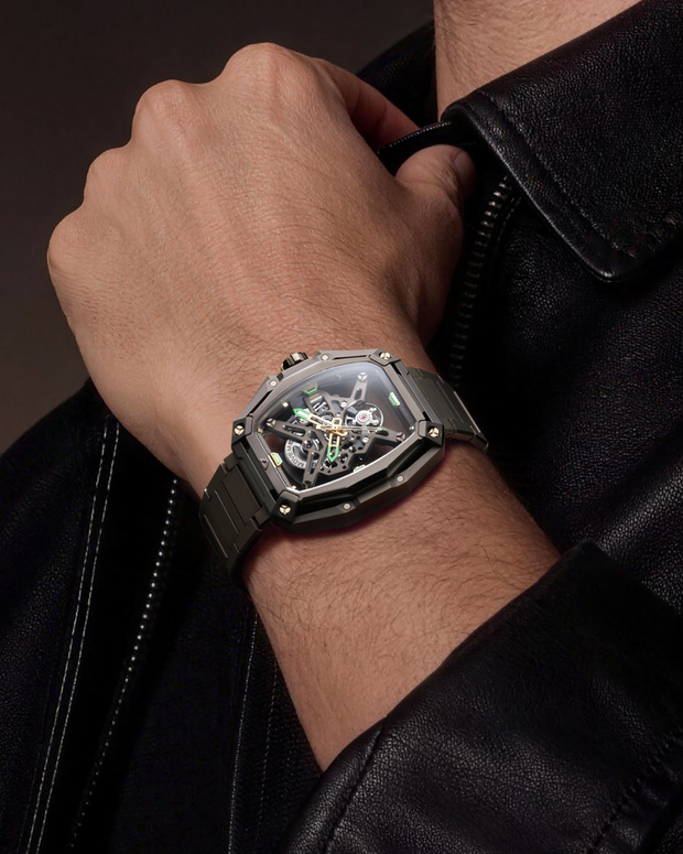 Wristshot of CIGA DESIGN Hunter Vintage Brown Gold automatic skeleton watch with integrated H-link bracelet