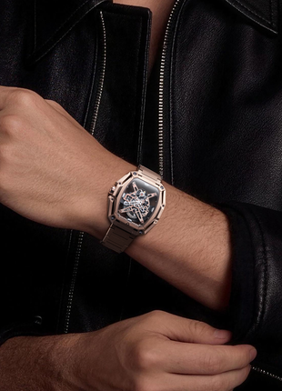 Wristshot of CIGA DESIGN Hunter Vintage Rose Gold automatic skeleton watch with integrated H-link bracelet