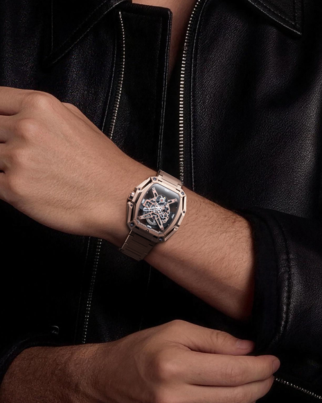 Wristshot of CIGA DESIGN Hunter Vintage Rose Gold automatic skeleton watch with integrated H-link bracelet