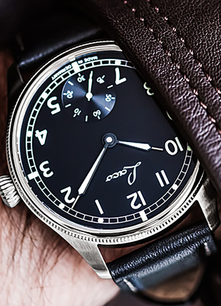 Wristshot of Laco Bremerhaven 42.5 Hand-Wound Navy Watch with matte black dial, subsidiary seconds and black calf leather strap
