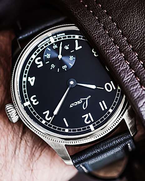 Wristshot of Laco Bremerhaven 42.5 Hand-Wound Navy Watch with matte black dial, subsidiary seconds and black calf leather strap