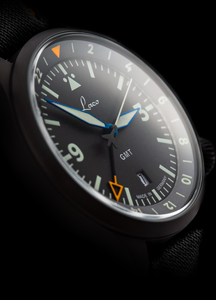 Close-up of Laco Frankfurt GMT Schwarz black pilot dial with internal GMT bezel and orange 24-hour hand