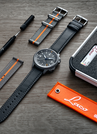 Laco Frankfurt 43 GMT Schwarz automatic watch with FiberTech and grey-orange nylon straps and accessories