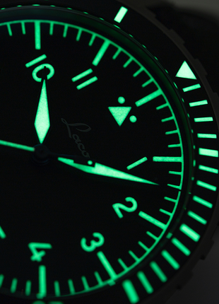 Lume shot of Laco Köln Grau matte black pilot watch dial