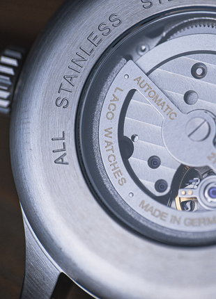 Close-up of Laco Valencia 39 sapphire display caseback showing the automatic movement
