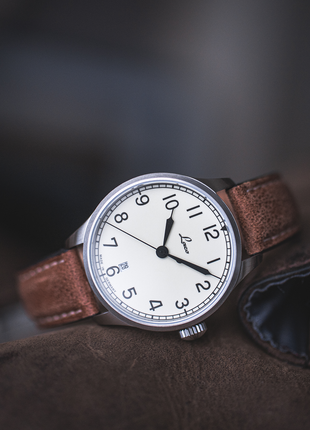 Close-up of Laco Valencia 39 marine-style dial with black Arabic numerals and hands