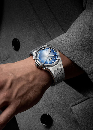 Lucky Harvey Chiming Watch 2.0 Blue titanium automatic watch worn on the wrist