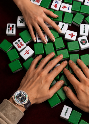 Lucky Harvey Mahjong 43mm rose gold automatic watch worn on the wrist