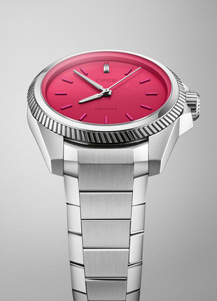 Oris ProPilot X Miss Piggy Edition 34mm automatic watch with vibrant pink dial angled view