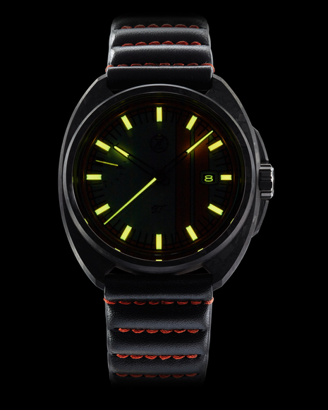 Lume shot of Zelos GT 42mm Carbon Heritage automatic watch with light blue dial and orange racing stripes