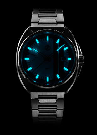 Lume shot of Zelos GT Ivory 40mm automatic watch with white dial and red racing stripes