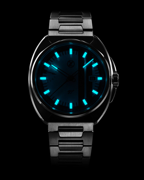 Lume shot of Zelos GT Ivory 40mm automatic watch with white dial and red racing stripes