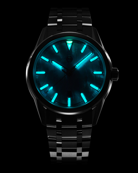 Lume shot of Zelos Helica 42 Wave MOP automatic watch with light blue mother-of-pearl guilloche dial